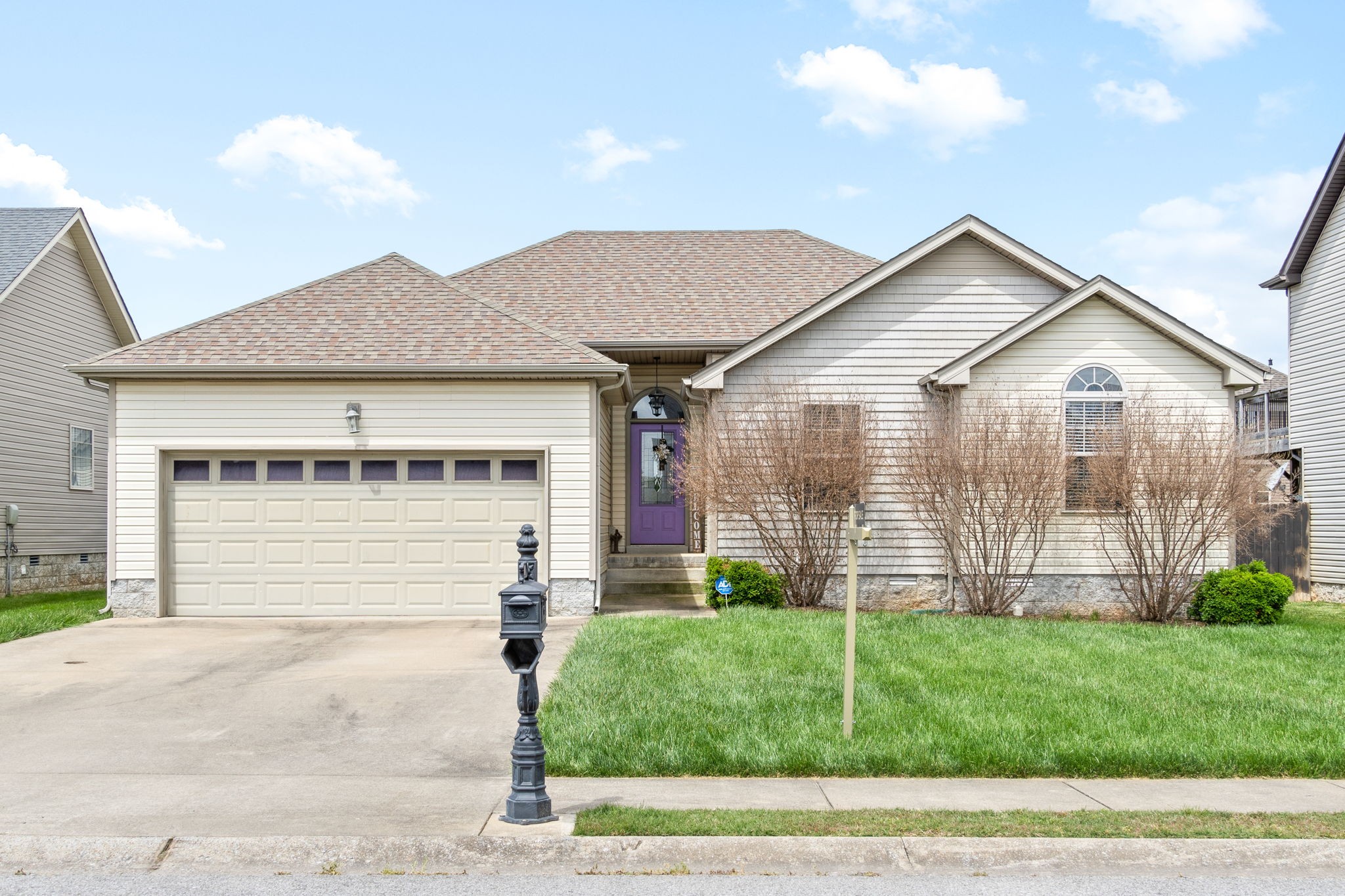 3784 Suiter Road Clarksville, TN 37040 - Photo 1 of 28 a front view of a house with a garden and plants