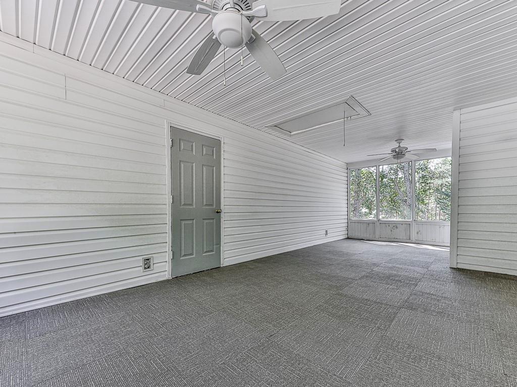 633 Butterworth Road Canton, GA 30114 - Photo 40 of 55 an empty room with windows