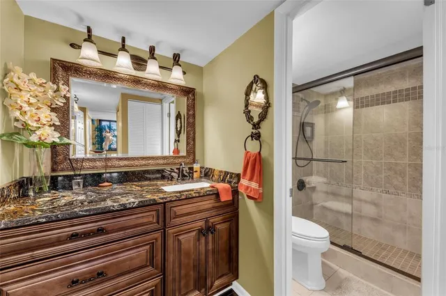 $695,000 | 5855 Midnight Pass Road, Unit 416, Sarasota, FL 34242