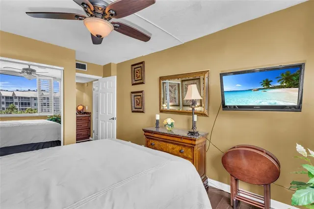 $695,000 | 5855 Midnight Pass Road, Unit 416, Sarasota, FL 34242