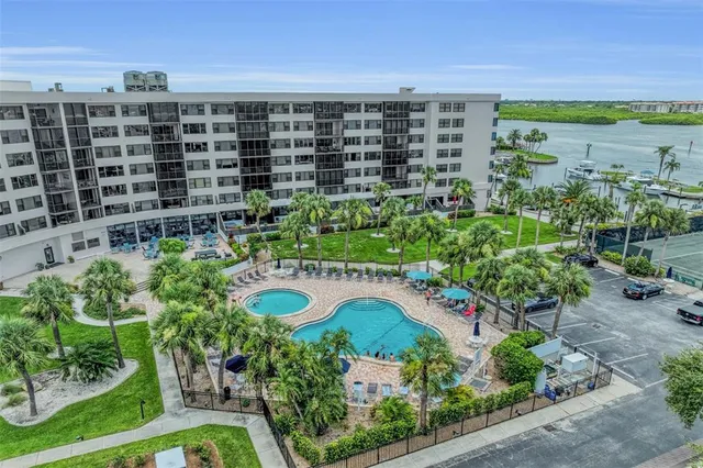 $695,000 | 5855 Midnight Pass Road, Unit 416, Sarasota, FL 34242