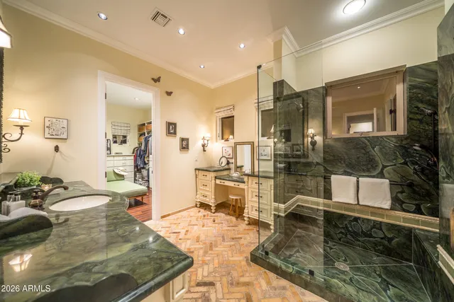 a large hall with dining table and chairs