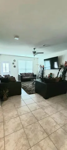 a kitchen with granite countertop a sink and cabinets