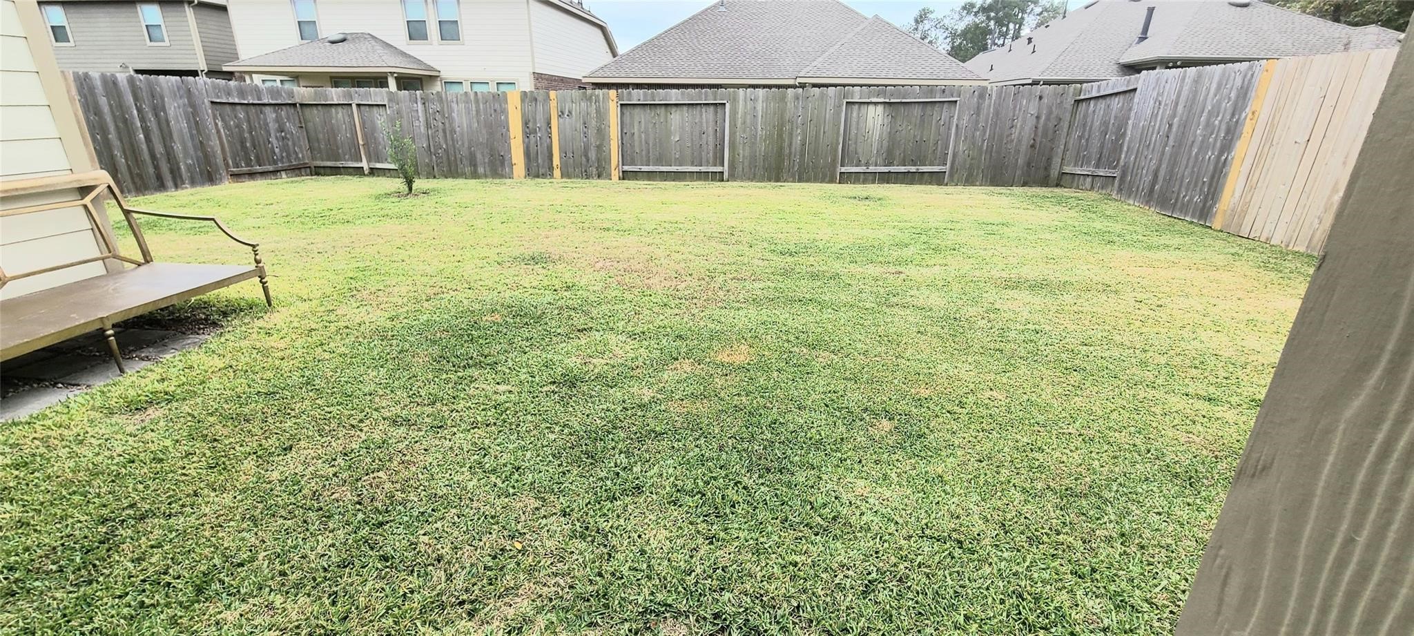 2710 Little Caney Way Conroe, TX 77301 - Photo 19 of 25 a view of a backyard