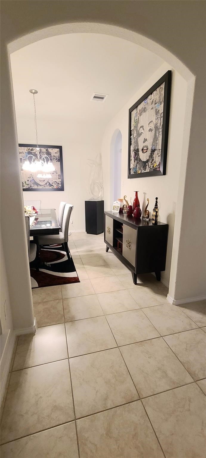 2710 Little Caney Way Conroe, TX 77301 - Photo 5 of 25 a kitchen with a stove a refrigerator and cabinets