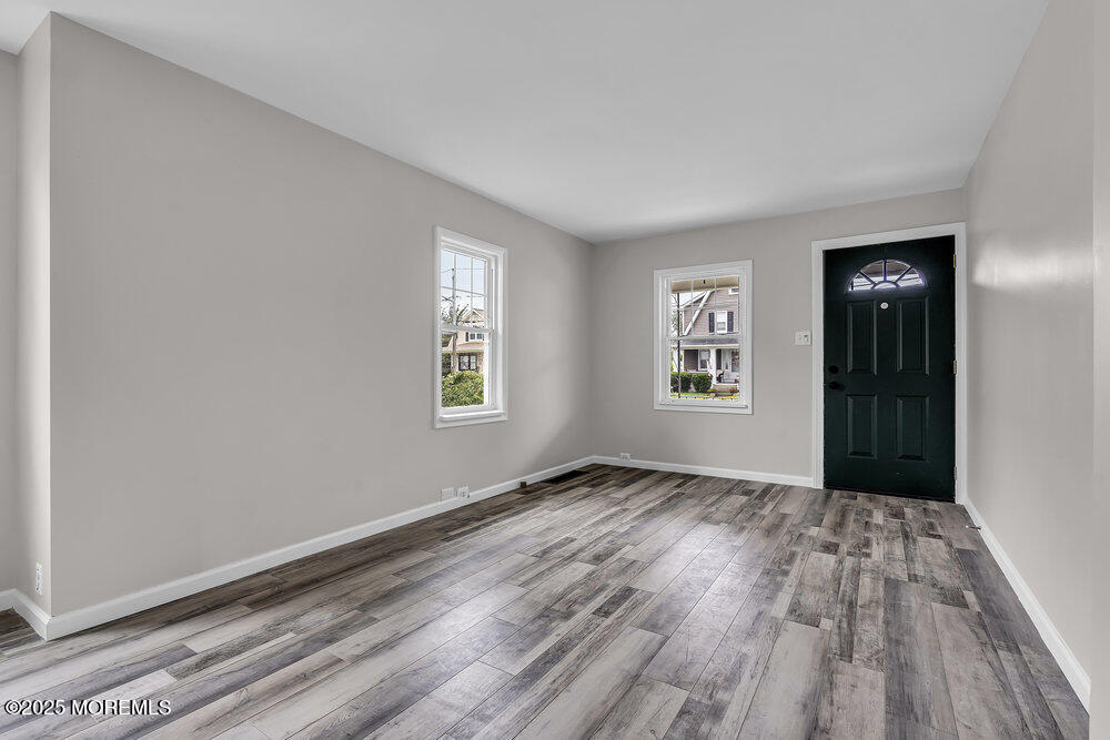 37 Knight Avenue Runnemede, NJ 08078 - Photo 22 of 50 wooden floor in an empty room with a window