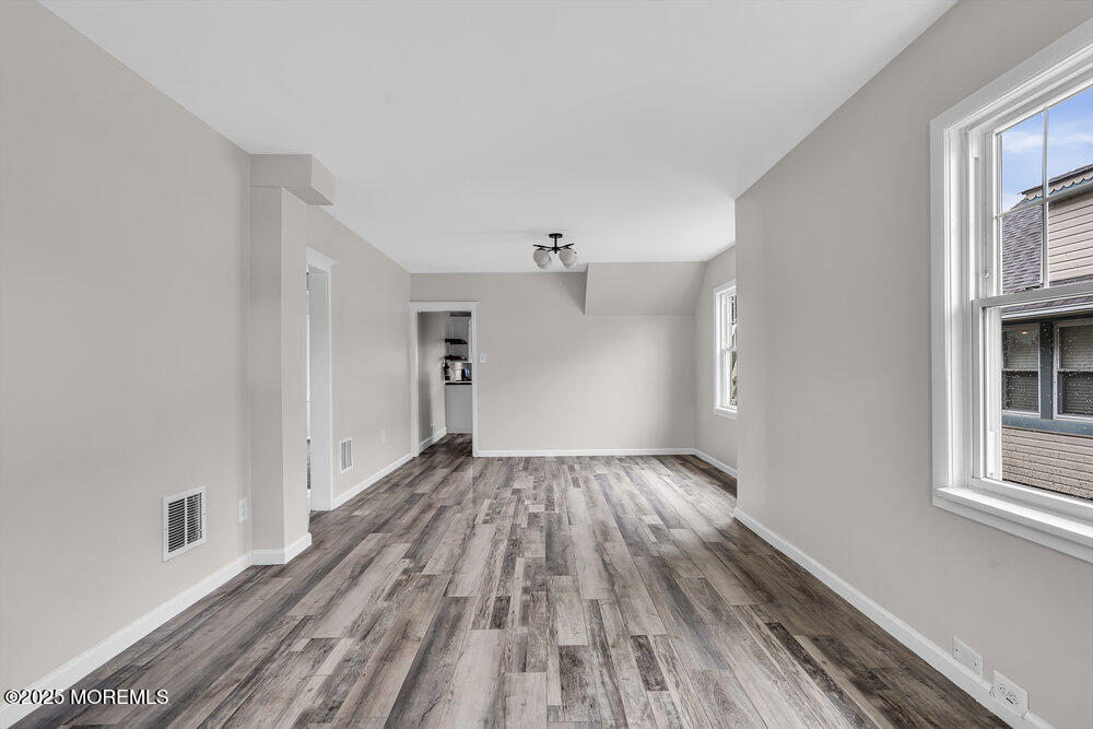 37 Knight Avenue Runnemede, NJ 08078 - Photo 25 of 50 wooden floor in an empty room with a window