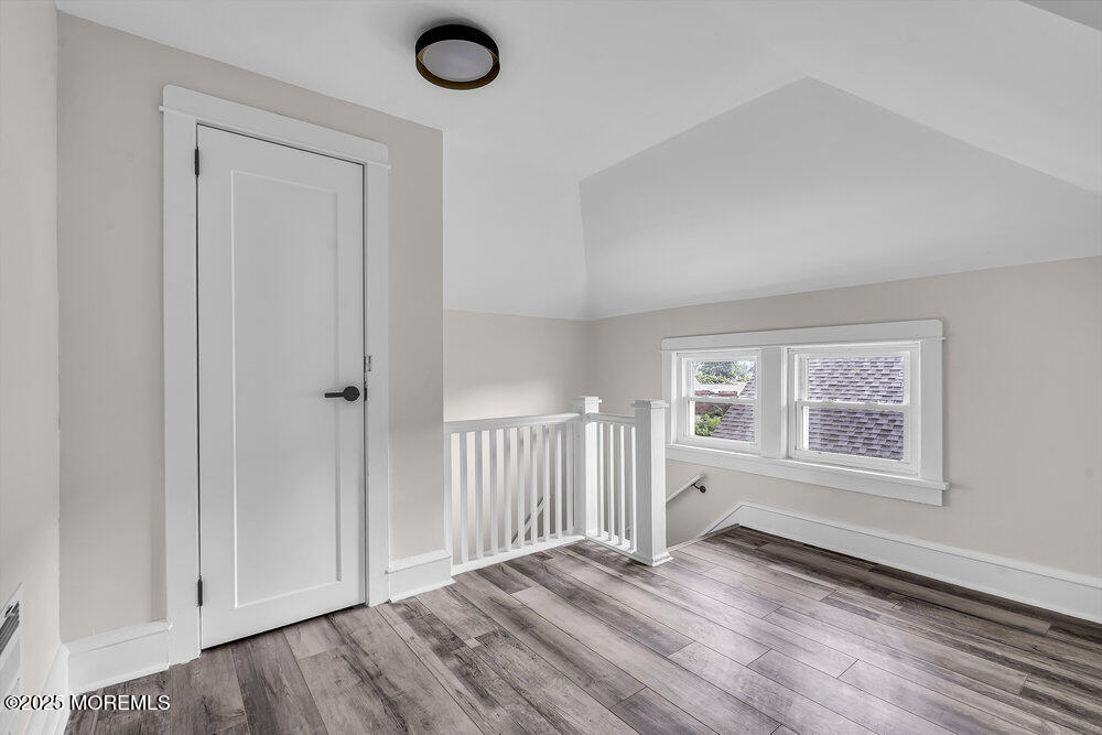 37 Knight Avenue Runnemede, NJ 08078 - Photo 39 of 50 an empty room with wooden floor and windows