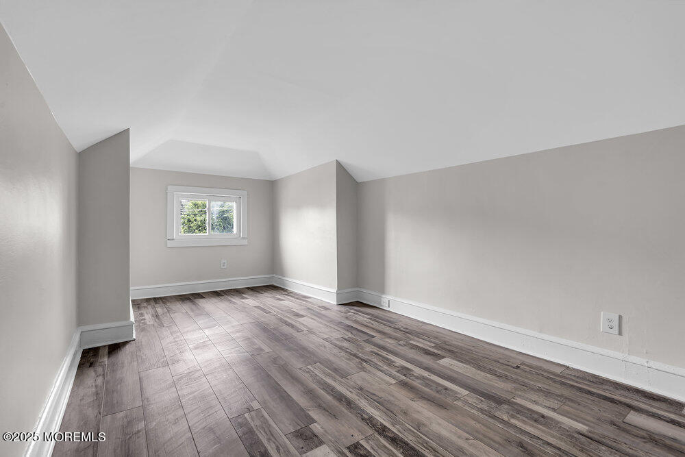 37 Knight Avenue Runnemede, NJ 08078 - Photo 42 of 50 an empty room with wooden floor and windows