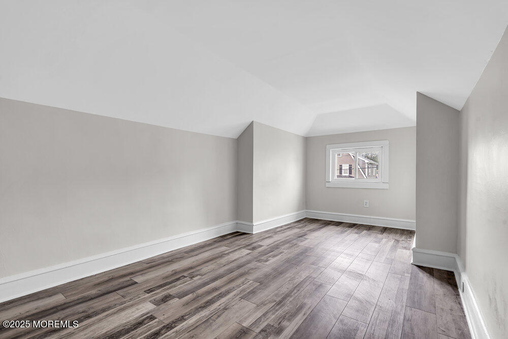 37 Knight Avenue Runnemede, NJ 08078 - Photo 43 of 50 an empty room with wooden floor and windows