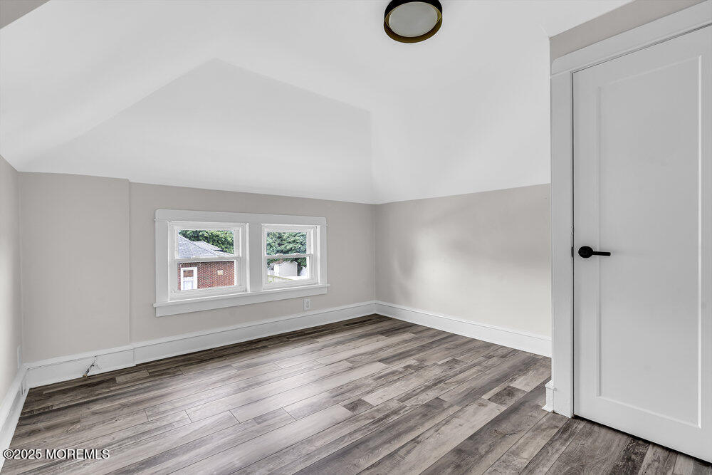 37 Knight Avenue Runnemede, NJ 08078 - Photo 45 of 50 an empty room with wooden floor and windows