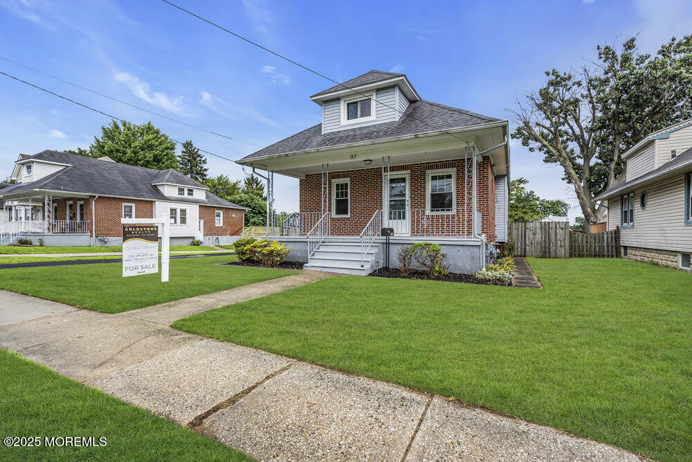 37 Knight Avenue Runnemede, NJ 08078 - Photo 6 of 50 a front view of a house with a yard