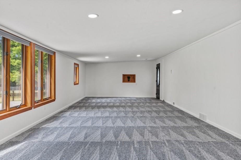 128 McGinley Road Chicora, PA 16025 - Photo 15 of 36 a view of an empty room and window