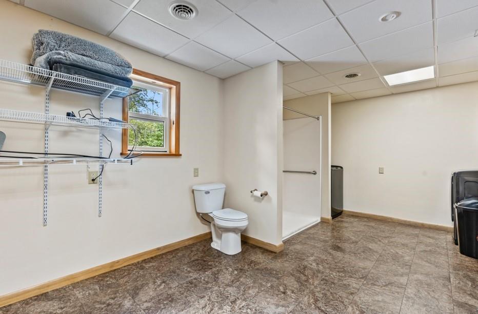 128 McGinley Road Chicora, PA 16025 - Photo 33 of 36 a bathroom with a toilet sink and shower