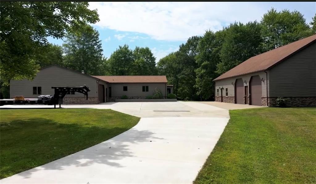128 McGinley Road Chicora, PA 16025 - Photo 34 of 36 a house view with a garden space