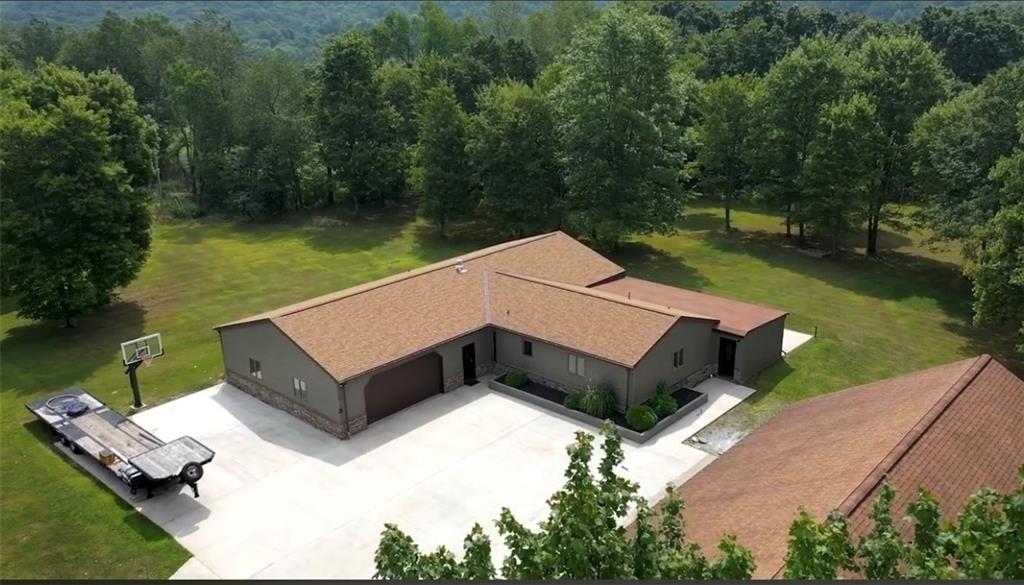 128 McGinley Road Chicora, PA 16025 - Photo 35 of 36 a aerial view of a house with a yard