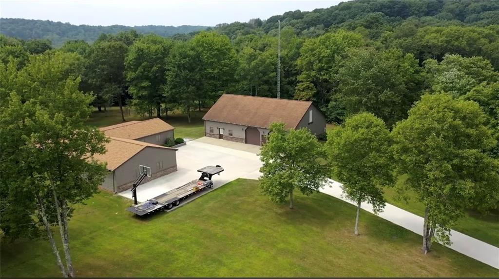 128 McGinley Road Chicora, PA 16025 - Photo 6 of 36 an aerial view of a house with a yard