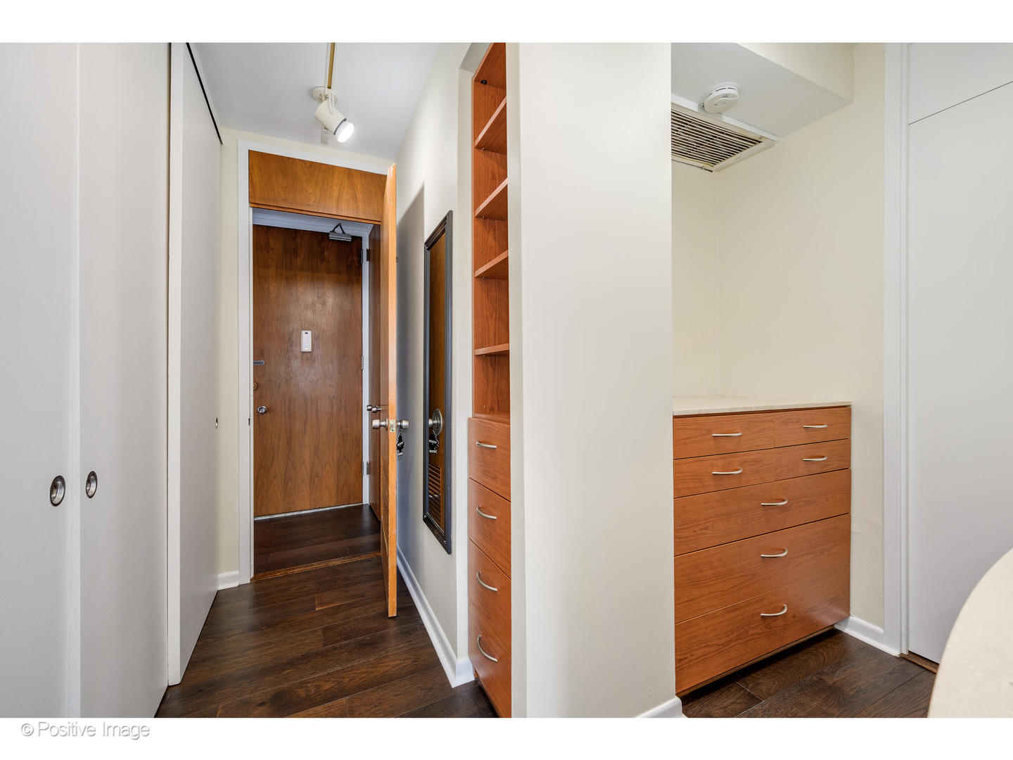 1300 North Astor Street, Unit 10D Chicago, IL 60610 - Photo 16 of 25 a view of a bedroom from the hallway