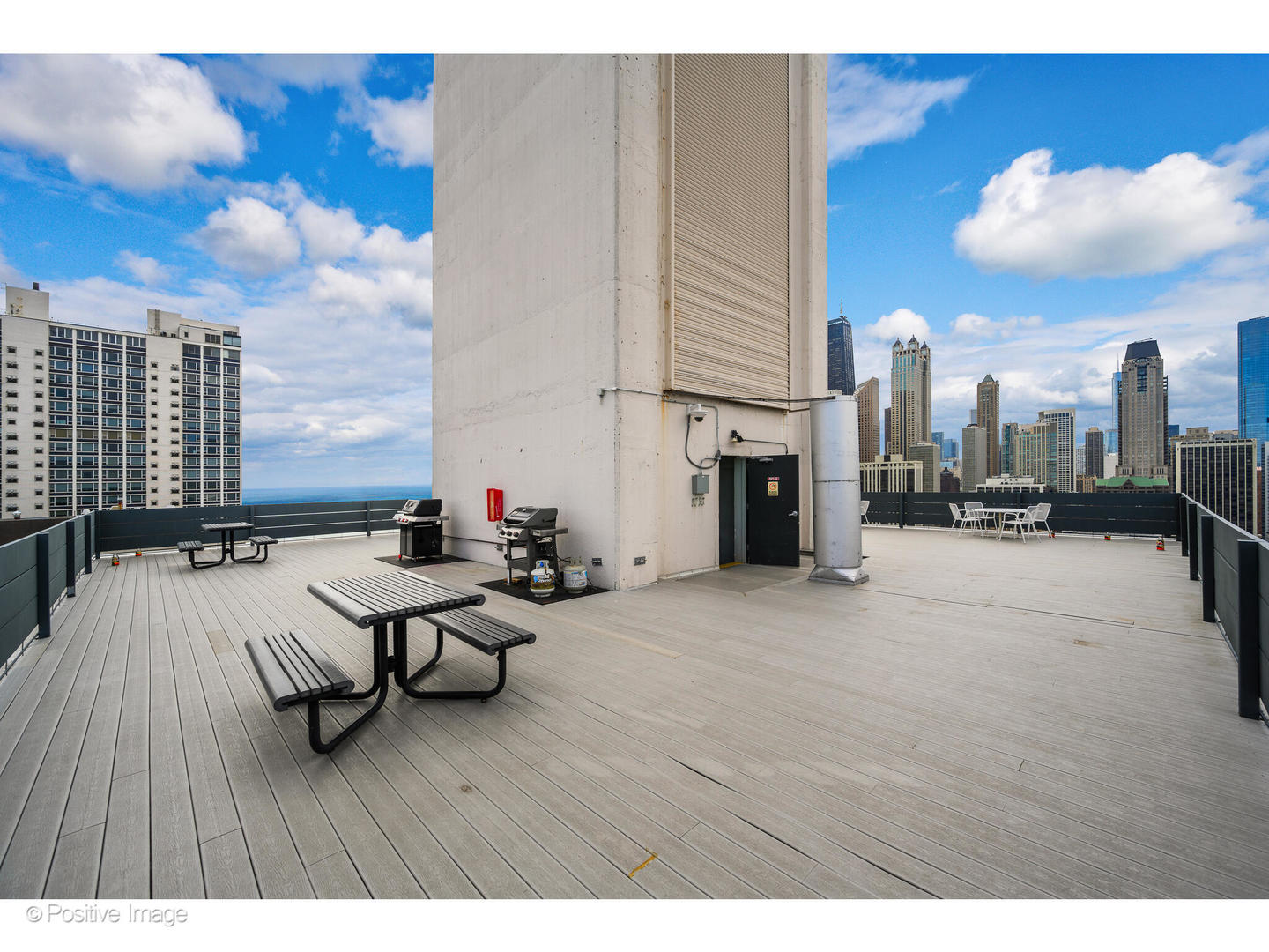 1300 North Astor Street, Unit 10D Chicago, IL 60610 - Photo 22 of 25 a view of a living room and chandelier