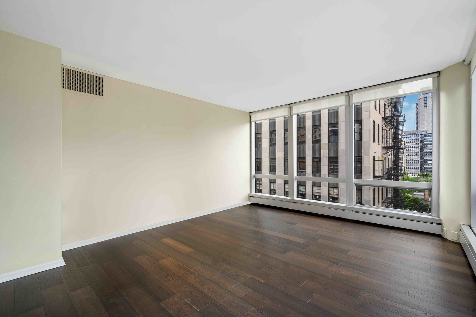 1300 North Astor Street, Unit 10D Chicago, IL 60610 - Photo 5 of 25 a view of a room with wooden floor