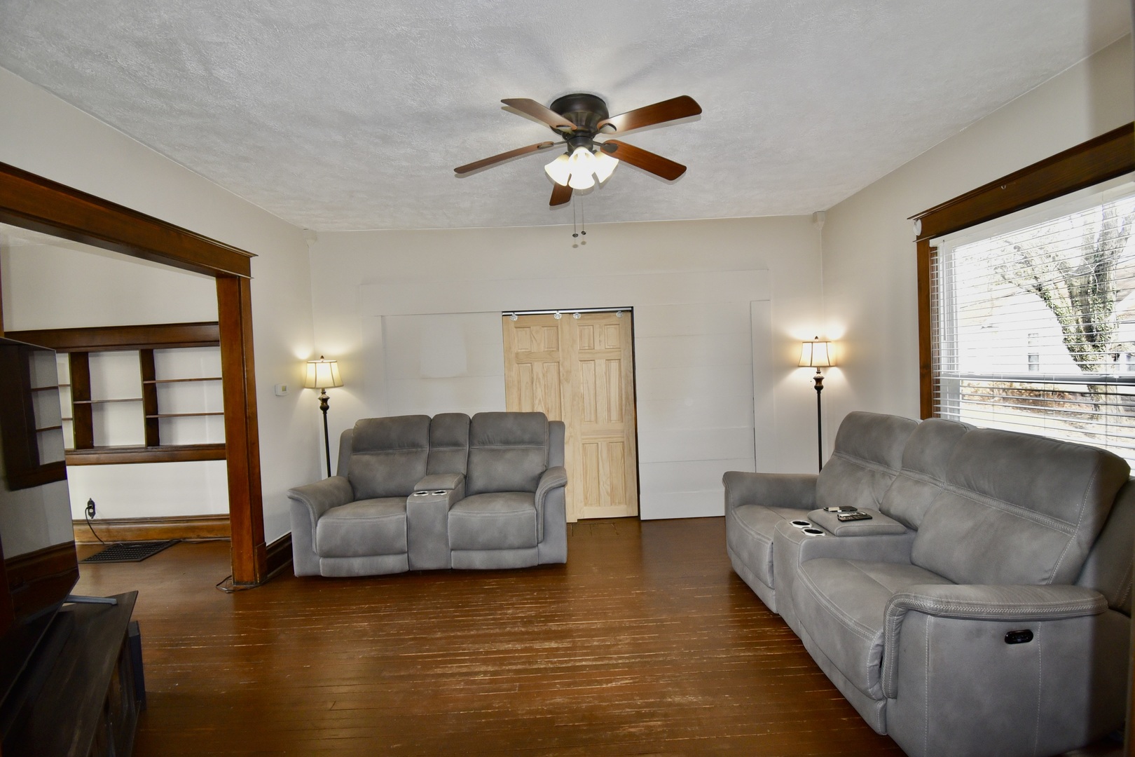 203 South Denver Street Bloomington, IL 61701 - Photo 12 of 54 a living room with furniture and a large window