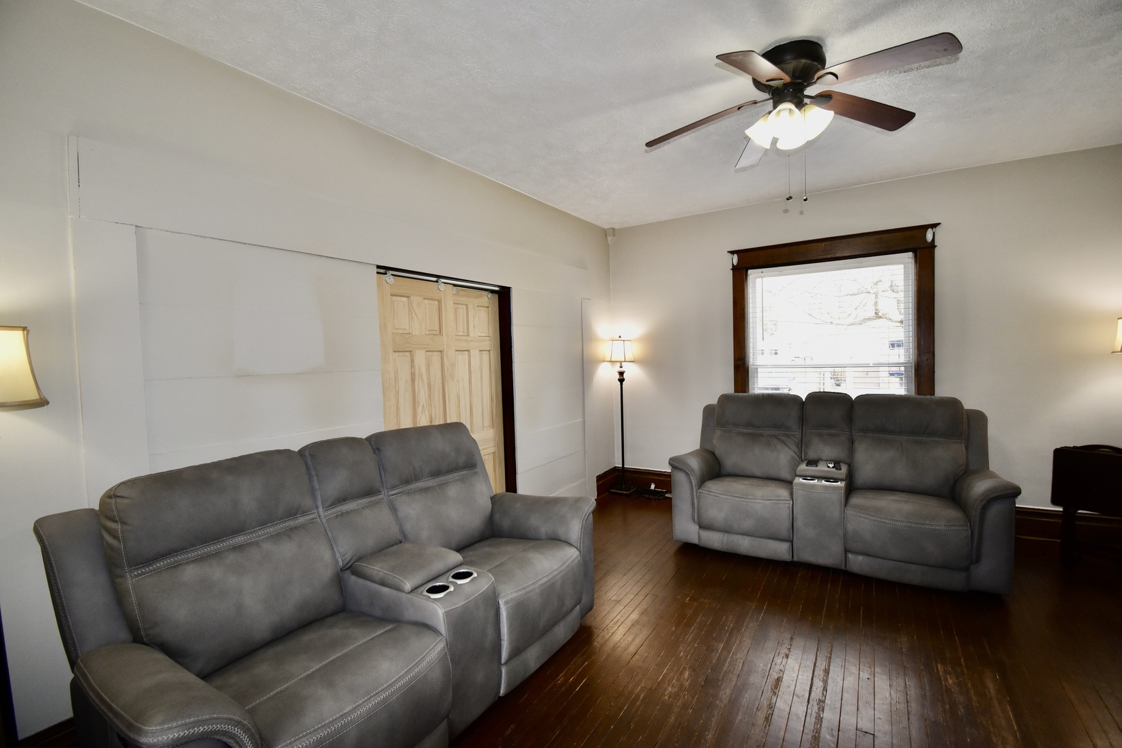 203 South Denver Street Bloomington, IL 61701 - Photo 30 of 54 a living room with couches and a coffee table