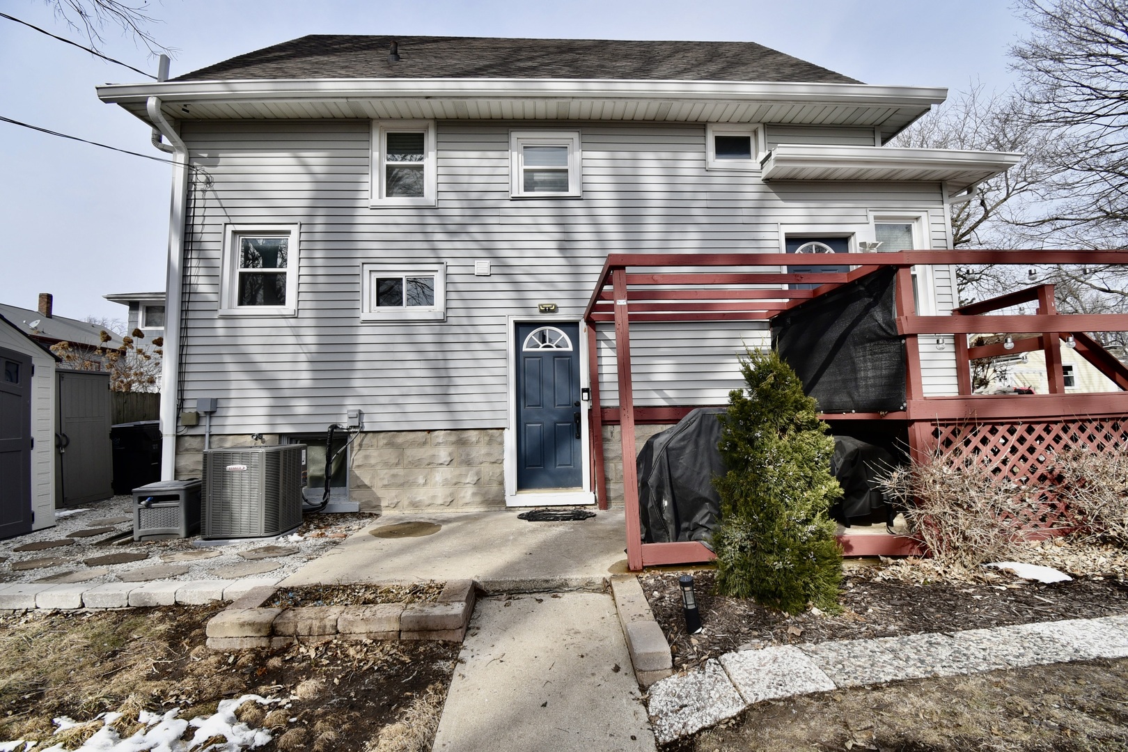 203 South Denver Street Bloomington, IL 61701 - Photo 3 of 54 a front view of a house with a yard
