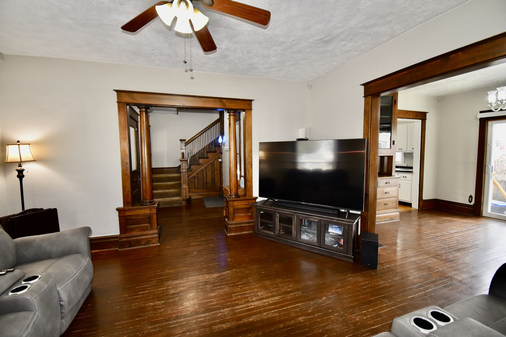 203 South Denver Street Bloomington, IL 61701 - Photo 31 of 54 a living room with furniture and a flat screen tv