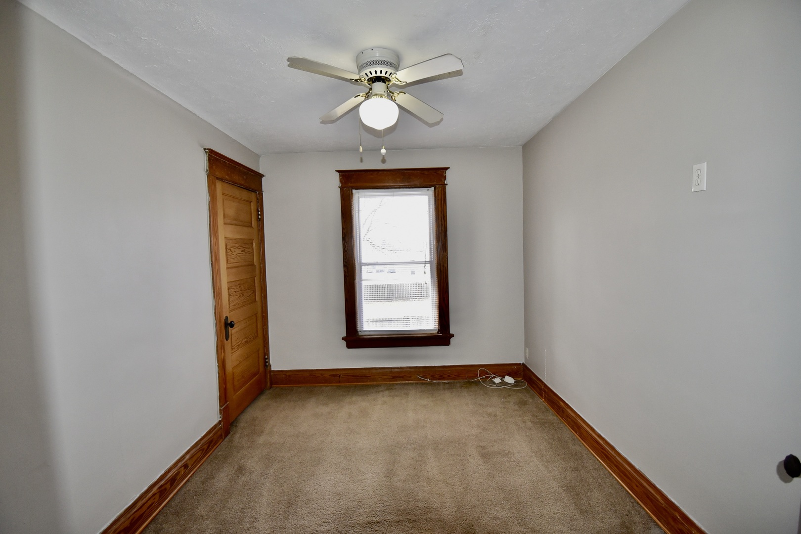 203 South Denver Street Bloomington, IL 61701 - Photo 34 of 54 an empty room with windows and fan