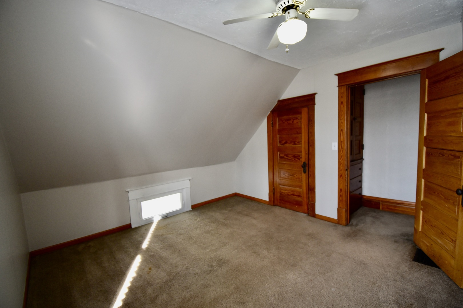 203 South Denver Street Bloomington, IL 61701 - Photo 41 of 54 a view of an empty room with a window