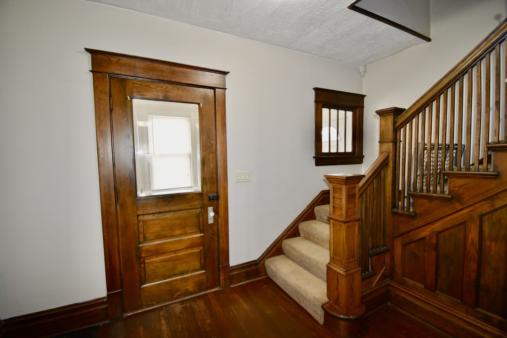 203 South Denver Street Bloomington, IL 61701 - Photo 53 of 54 a view of entryway with wooden floor and stairs