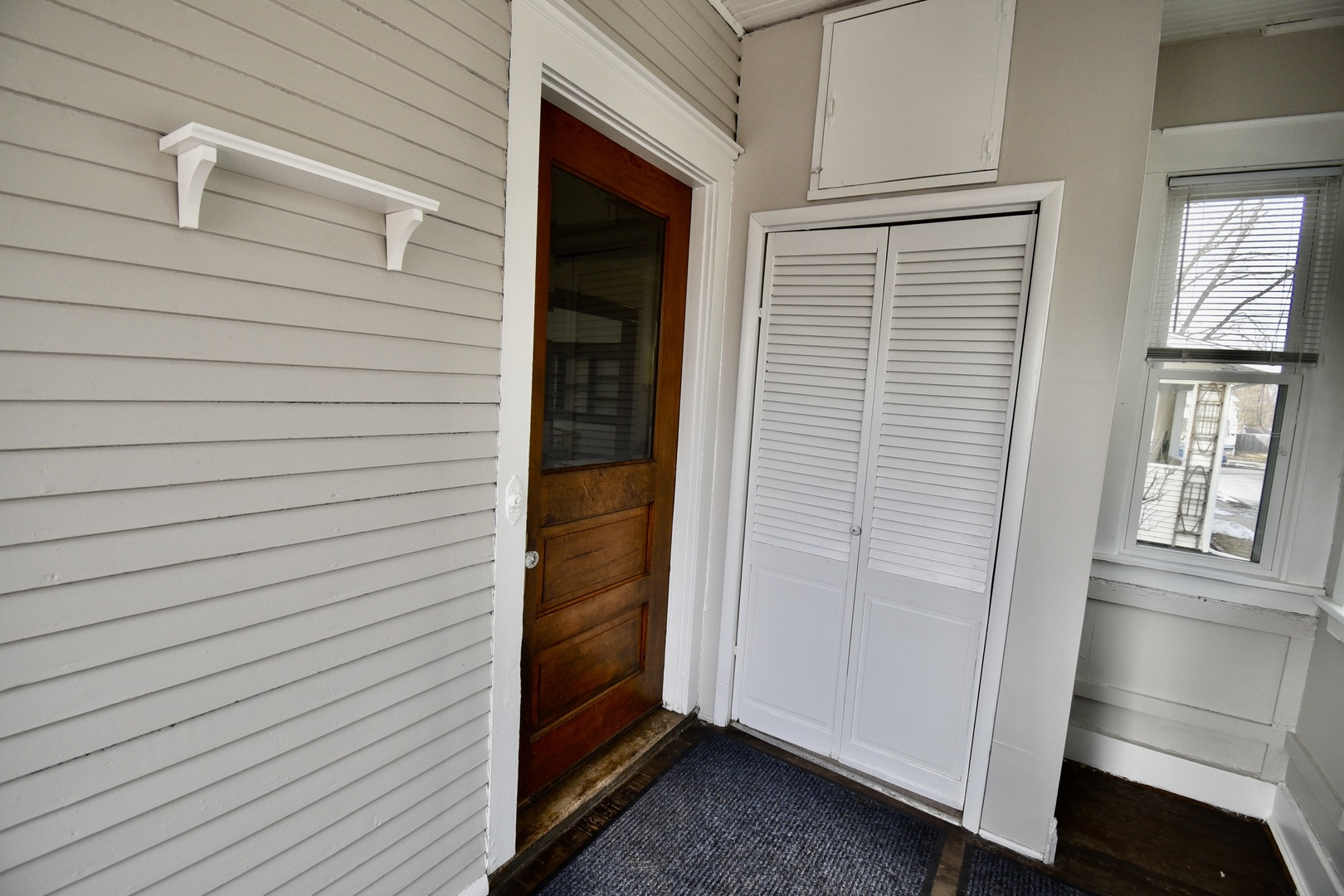 203 South Denver Street Bloomington, IL 61701 - Photo 6 of 54 a view of front door and porch
