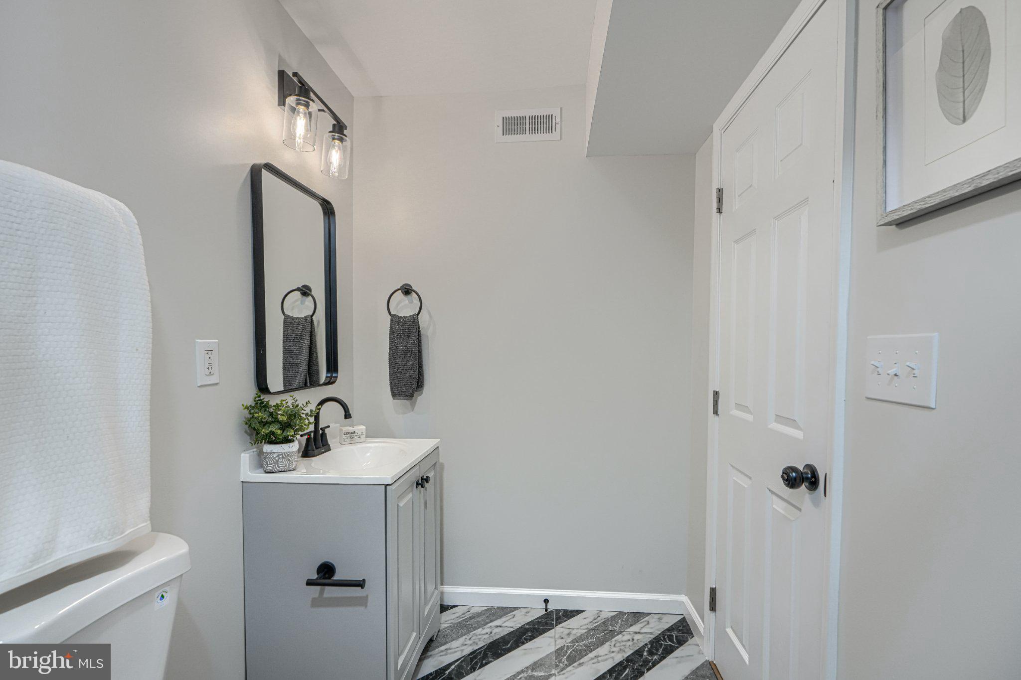 143 Rigdon Road Aberdeen, MD 21001 - Photo 25 of 57 Sleek modern bathroom with stylish accents.