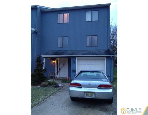 153 Redpine Loop Old Bridge, NJ 08857 - Photo 1 of 25 a car parked in front of a house