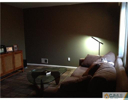 153 Redpine Loop Old Bridge, NJ 08857 - Photo 16 of 25 a bedroom with a bed and window
