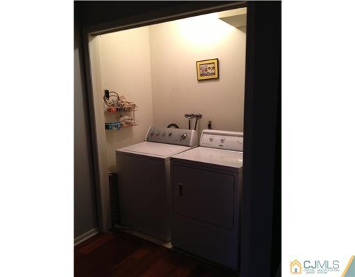 153 Redpine Loop Old Bridge, NJ 08857 - Photo 17 of 25 a bathroom with a sink and a mirror