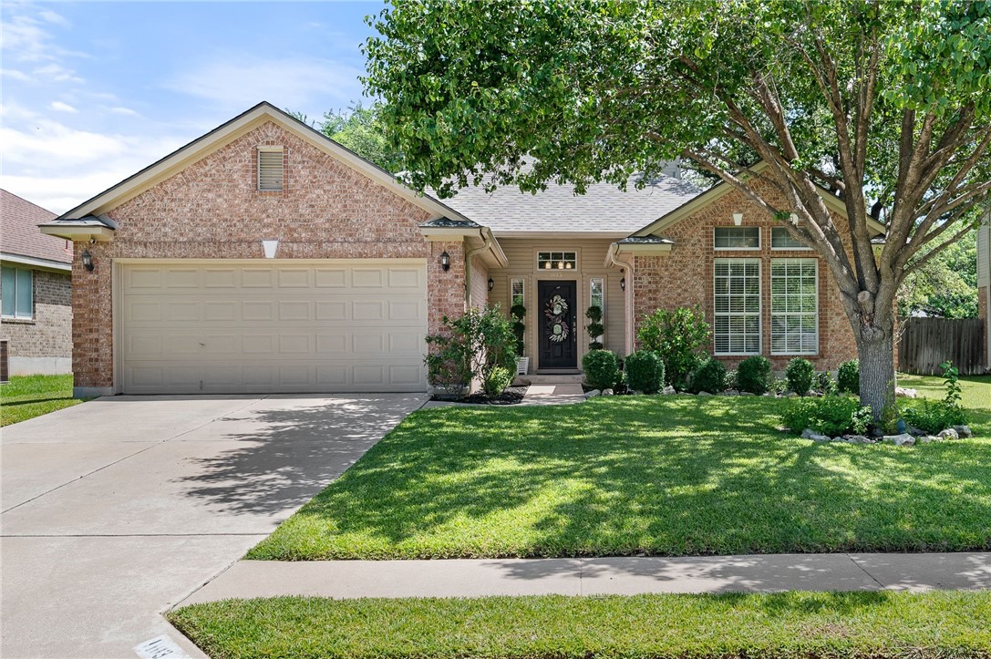 1103 Red Ranch Circle Cedar Park, TX 78613 - Photo 1 of 1 a front view of a house with a yard and garage