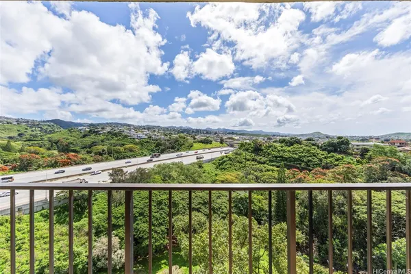 a view of a city skyline from a balcony