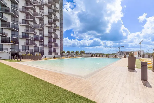 a view of a lake with a city