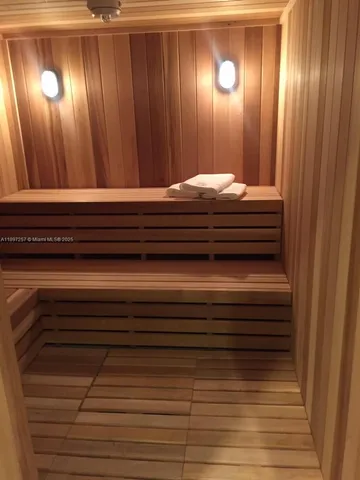 a bathroom with a bathtub and sink