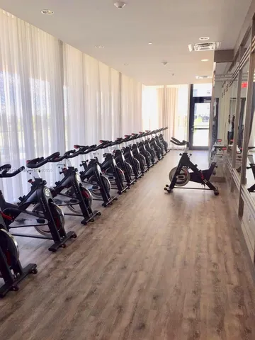 a kitchen with a sink a stove and cabinets