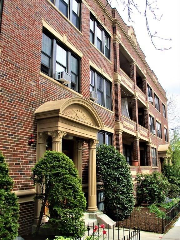153 Strathmore Road, Unit 8 Boston, MA 02135 - Photo 1 of 14 a front view of a multi story residential apartment building