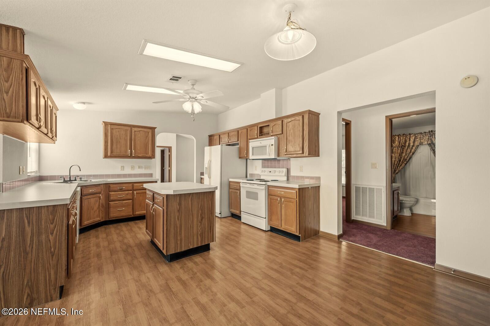 305 Palmetto Bluff Road Palatka, FL 32177 - Photo 3 of 34 Kitchen Area into Hall