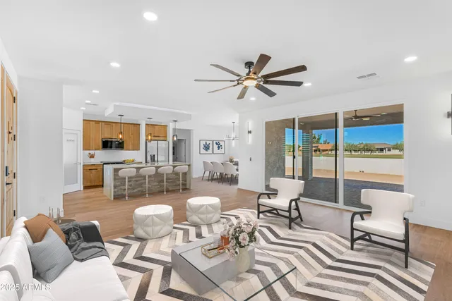 a bedroom with a bed and a potted plant