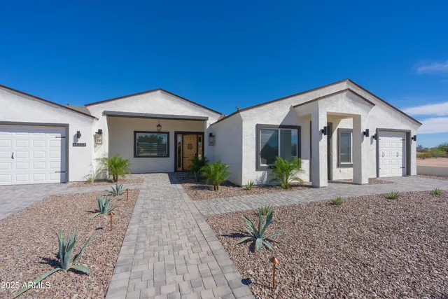 a view of a house with a patio