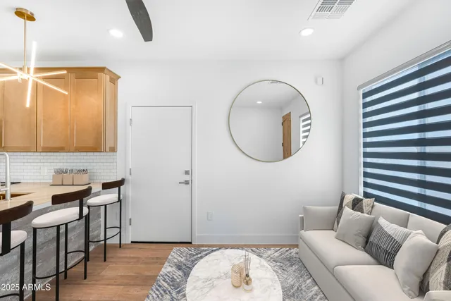 a view of a kitchen with a sink and cabinets
