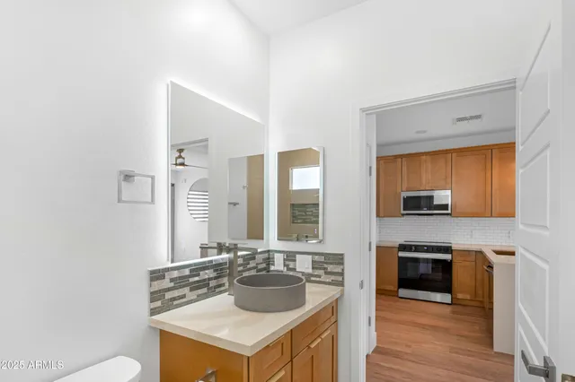 a view of a golf course with a lake