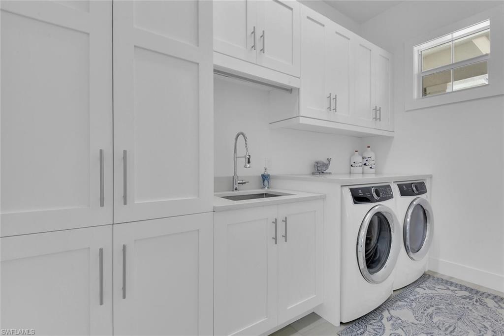 2130 Curtis Street Naples, FL 34112 - Photo 24 of 31 a utility room with sink dryer and washer