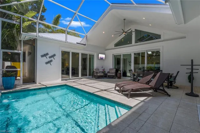 a utility room with sink dryer and washer