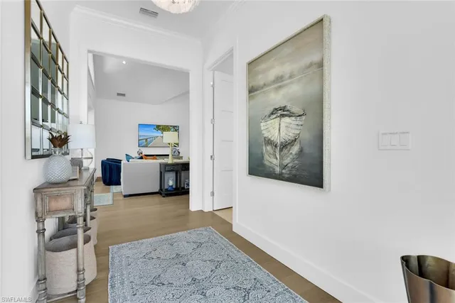 a view of a bedroom with workspace and a couch